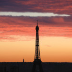 The Eiffel Tower is seen at sunset in Paris, France, November 22, 2015. The capital will host the World Climate Change Conference 2015 (COP21) from November 30 to December 11.