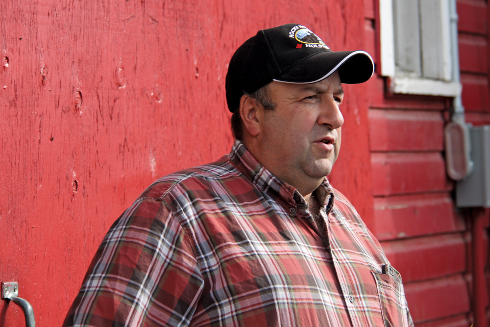 At Rocky Mountain Holsteins, farm manager Ron Churchill uses  genomics to develop elite dairy breeding stock.