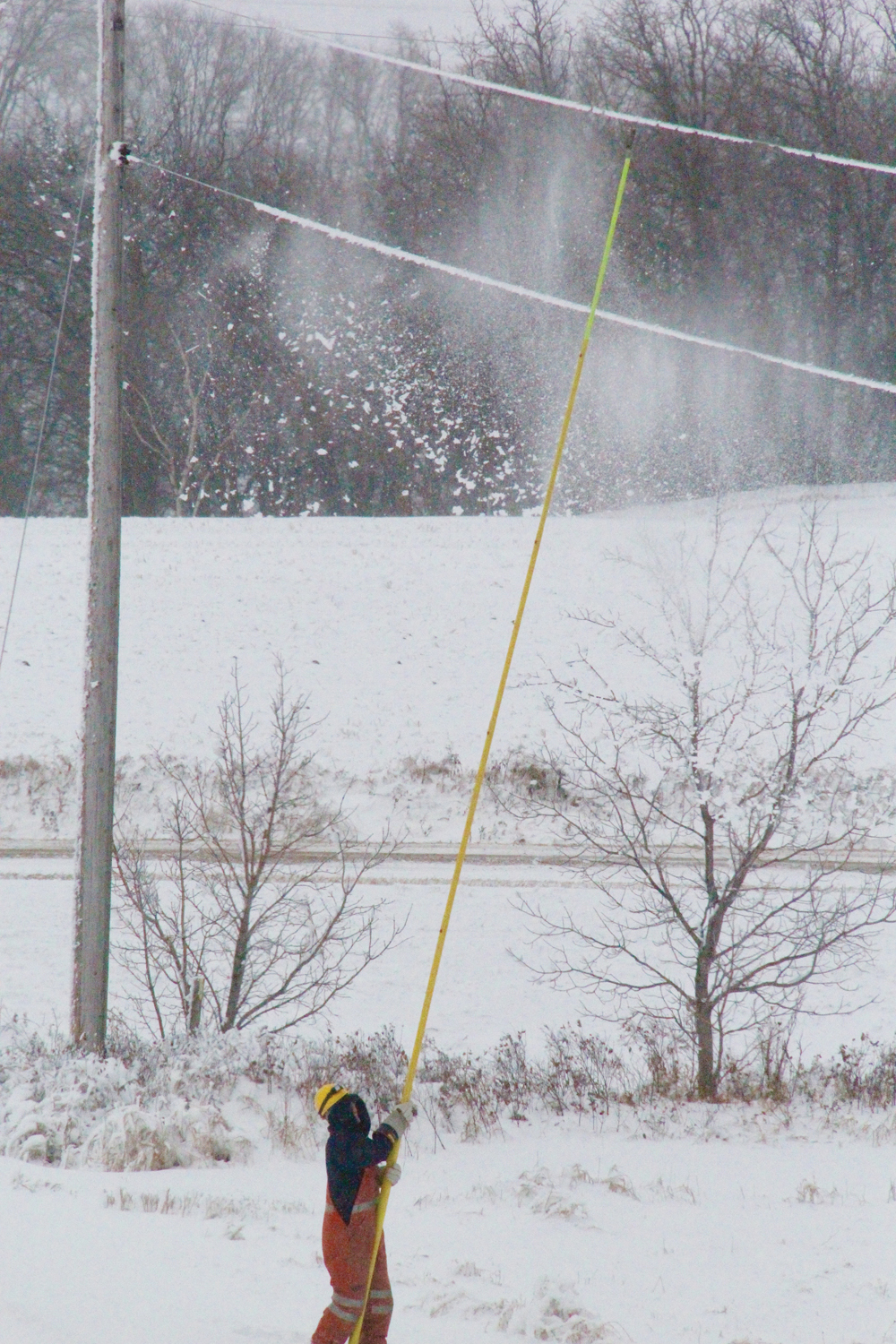 Manitoba Hydro staff have been running hard this week clearing ice from power lines. This Hydro employee was knocking hoarfrost off a line three miles west of Miami, Man., Thursday (Dec. 17) afternoon. Power outages have occurred in many areas of Manitoba, especially in south-central and western regions. In some cases transmission lines have been damaged, while in others Manitoba Hydro has turned the power off so staff could clear the lines. Some people on social media have reported being without electricity for 12 hours.