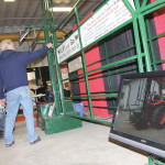 Mike Annetts’ colleague Garry Smith explains how the Lift and Go operates to visitors at Inventors’ Showcase.