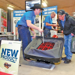 Entrants in the New Product competition get a chance to demonstrate  their  innovations one on one with farmers.