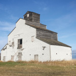 Built in 1945 for landowner Ernest Hoffman as a make-work project for Japanese detainees sent inland from British Columbia during the Second World War, this privately owned grain elevator near Brunkild in the Rural Municipality of Macdonald featured a plaque written in Japanese that gave Hoffman’s initials and the symbol for “prosperity.” Its machinery was dismantled in the 1960s, after which it was used as a granary.