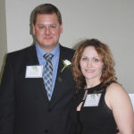 Outstanding young farmers Jason and Laura Kehler received their plaque from Manitoba Agriculture, Food and Rural Development Deputy Minister Dori Gingera-Beauchemin.  