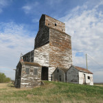This grain elevator in the village of Oberon, on the CPR Varcoe Subdivision in the Municipality of North Cypress-Langford, was once operated by the Oberon Cooperative Elevator Association as part of the Manitoba Pool Elevators network. It now stands abandoned.