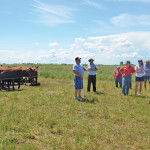 Brian Harper discusses his high stock density grazing program during a summer field tour on his operation last year.