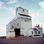 A grain elevator at the railway siding of Bryd, along Highway 16 in the Rural Municipality of Yellowhead, was constructed in 1914 by Smith Murphy. It was purchased by the Paterson Grain Company in 1926 and an annex was constructed in 1956. The elevator operated into the early 1990s when a provincial government report said there were “no plans to close it in the foreseeable future.” However, it closed in the fall of 1994, and the building was pushed over and burned in February 1996.   PHOTO: MANITOBA HISTORIC RESOURCES BRANDON (JULY 1993)
