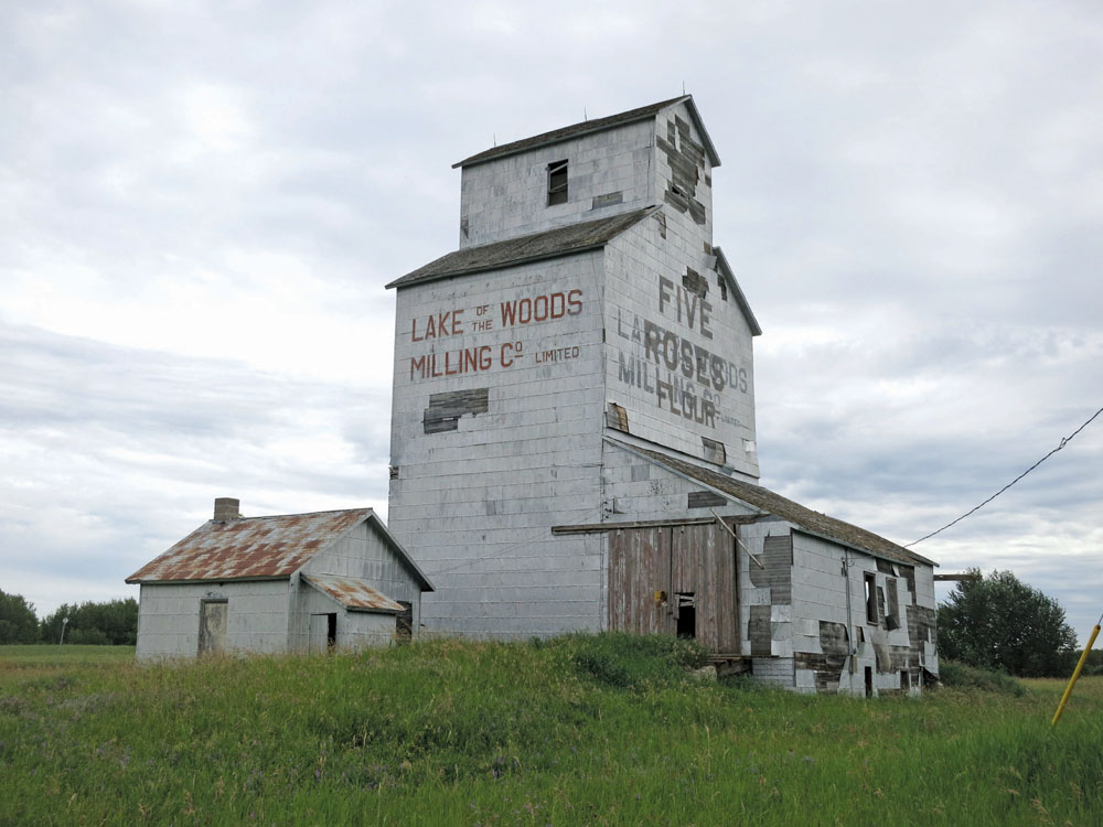 A grain elevator at Harmsworth, on the CP Rocanville Subdivision in the Rural Municipality of Wallace, was built by W. W. King for the Lake of the Woods Milling Company of Winnipeg in 1910. It was sold to Manitoba Pool Elevators in 1960 and operated by the McAuley Pool Association until it was sold to private interests in 1963. It appears to have stood abandoned for a number of years. 