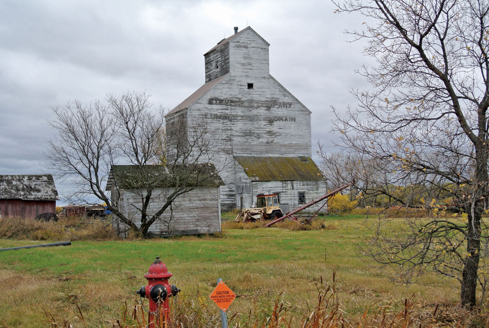 A small, abandoned grain elevator in Fannystelle, along Highway No. 2 in the Rural Municipality of Grey, was once operated by local lumber, coal, and grain merchant Richard H. Stevens (1896-1978).