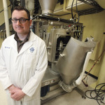 Peter Frohlich stands in front of Cigi’s new Ferkar mill, which will be used in a new project researching pulse flours.