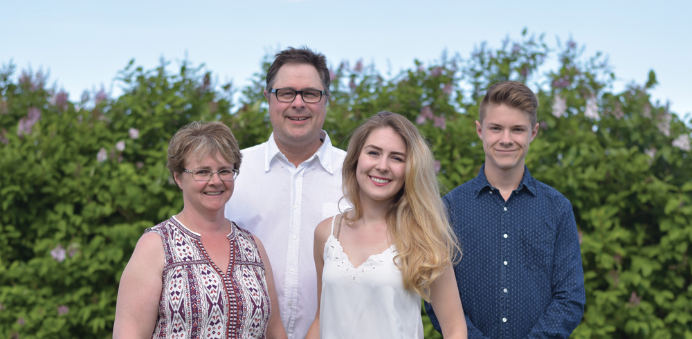 Cal and Cathy Penner, with their children Nikki and Eric, have been named the 2016 Red River Ex farm family of the year.