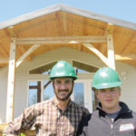 Lundar School carpentry teacher Donald Nikkel (l) oversees the school's Industrial Arts home-building project giving students like 16-year-old Cauy Kinkead valuable training and skills.