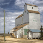 A 40,000-bushel elevator in Warren was built in 1948 by Manitoba Pool. Its capacity was more than doubled with the construction of an attached annex in 1956. It became the “A” elevator when Pool bought Federal Grain in 1972, with the former Federal elevator (now gone) becoming the “B” elevator. The railway line was abandoned in June 1992 but the elevator