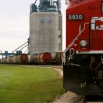 CP railway engine and grain cars