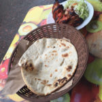 Get the whole family involved in making this naan recipe by letting everyone take
turns forming and cooking the bread on the griddle.