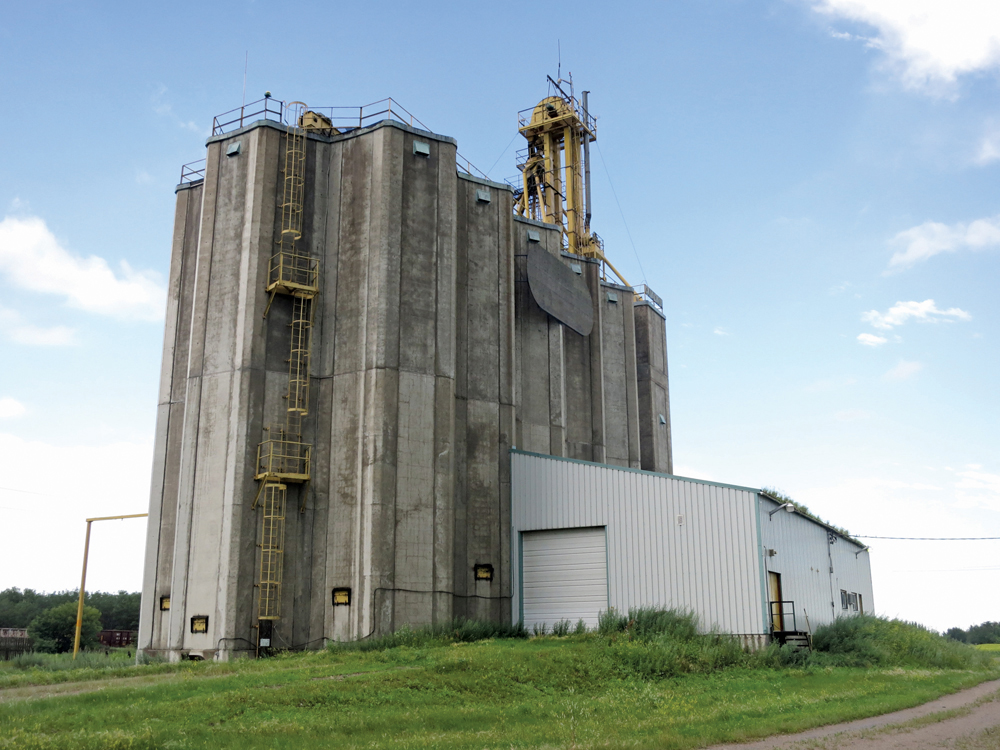 Built between 1979 and 1980 as an experiment by Manitoba Pool Elevators,  the concrete elevator at Quadra, near Miniota, has 16, six-sided  silos providing a total capacity of 150,000 bushels. In 1987, a wooden  grain elevator from Kenton, built in 1967, was moved beside it to  provide additional storage space. The facility closed in 2002 and the  annex was demolished in late 2003. In 2006, the elevator was sold to a  local farmer who rebuilt a 17-car rail spot and uses it for storage and  shipping.