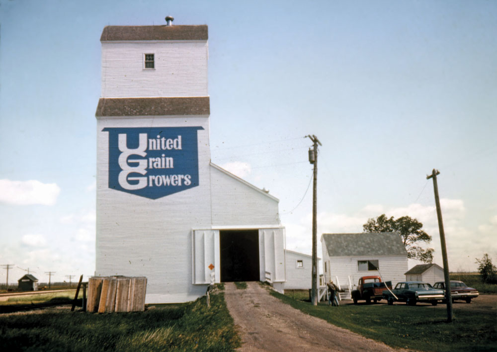 Constructed in the summer of 1938, a wooden elevator at Rignold (formerly Ridgeway) on the CNR Gladstone Subdivision, in the Rural Municipality of Portage la Prairie, was operated by United Grain  Growers. An annex was added to it in 1955, bringing its total capacity to 82,000 bushels. The facility is believed to have been demolished sometime after 1994.