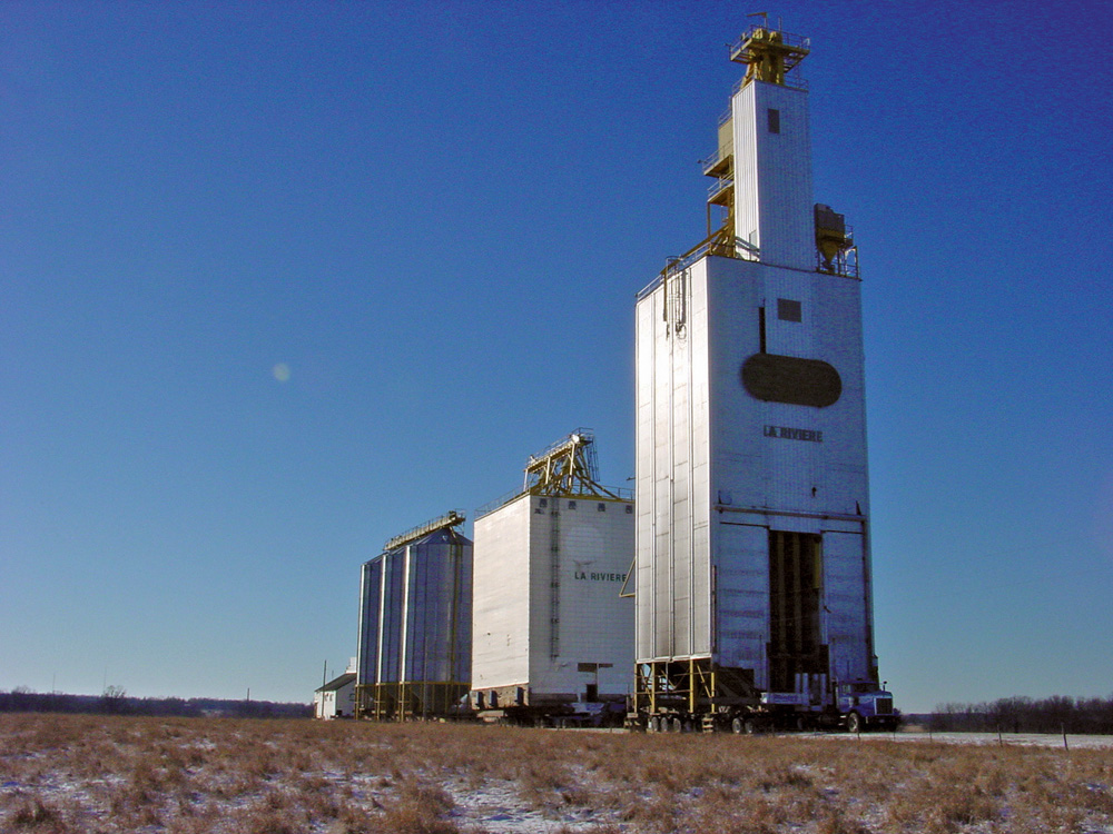 In 1994, a new elevator was opened at La Riviere by Manitoba Pool,  joining an annex built in 1980. In November 2004, both of them, along  with three steel bins, were moved 14 miles north to Somerset and set  beside an elevator built there in 1992, doubling its capacity. The  facility is now in use by Delmar Commodities.