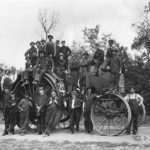 A class at the Manitoba Agricultural College (MAC) posing with a 30-horsepower Big Four tractor. One of the college’s engineering courses trained people in the operation of steam and gas engines. There was a great demand for trained operators at this time. The photo also demonstrates how large a tractor the Big Fours were. The rear wheels dwarf the students standing beside them and one of these students, the man on the ground at the rear of the wheel, is over six feet tall. If you recognize any of the men in this photo, the museum would like to get their names and any history you are able to provide.