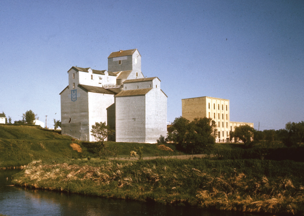 Between 1881 and 1883, the Glenwood Roller Mills was built on the bank  of Plum Creek in Souris by entrepreneurs George McCulloch and William  Herriot. The facility included a grain elevator and annex in addition to  the flour mill. The mill closed in 1921 due to the economic depression  that followed the First World War. Purchased by the McCabe Grain Company  in 1938, the firm constructed a new grain elevator in 1961. The facility  was bought by United Grain Growers in March 1968. Closed around 1995, the old plant was demolished in June 1996.