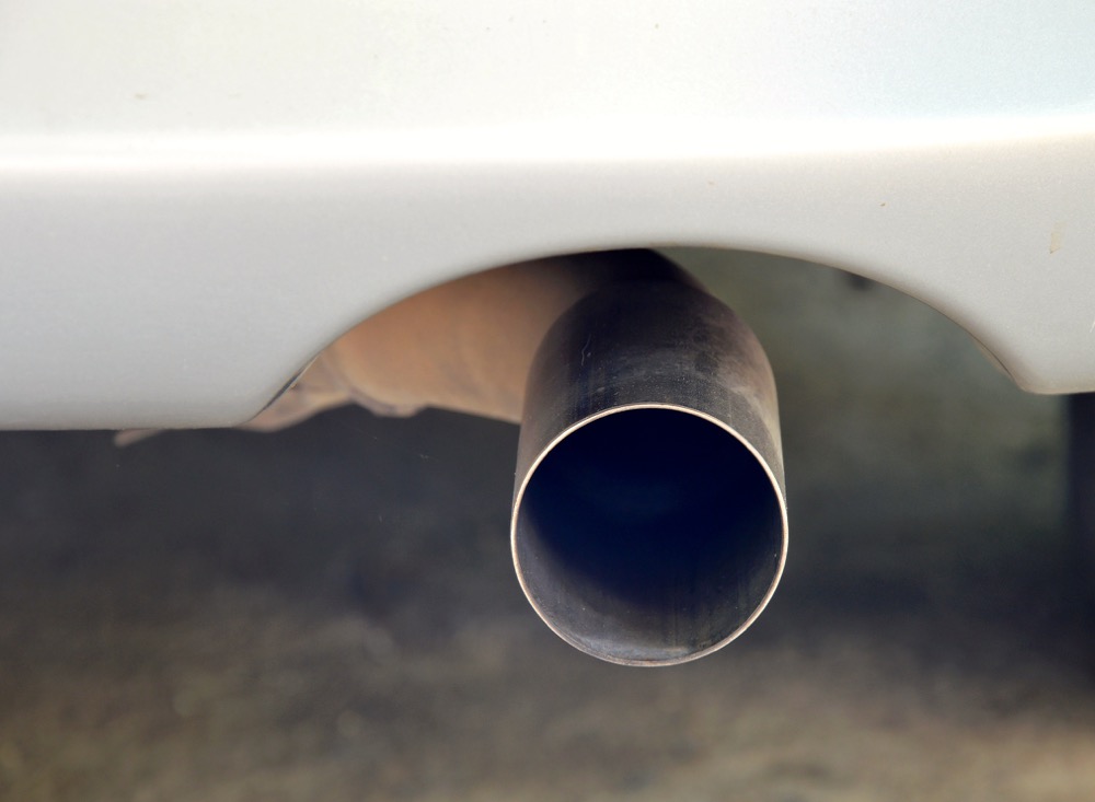 exhaust pipe under car bumper