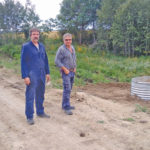 Farm land owner Boris Michaleski (left) and IMCD technician Aaron Kulbacki stand at one of two dry dam sites constructed earlier this year on Michaleski’s farm land to temporarily hold back water during peak flows.