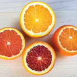 Orange varieties to try (clockwise from top: navel orange, tangelo, blood orange, cara cara orange).
