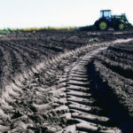 Lower air pressure in tires to reduce soil compaction