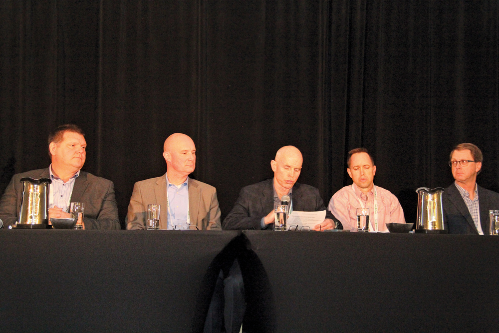 Public and private wheat breeding was discussed by a panel at the 3rd Canadian Wheat Symposium in Ottawa Nov. 23. The participants were (l) Ontario farmer Henry Van Ankum, Marcus Weidler, Bayer CropScience, Garth Patterson, Western Grains Research Foundation,  Jim Anderson, wheat breeder, University of Minnesota and Rob Graf, a winter wheat breeder with Agriculture and Agri-Food Canada. 