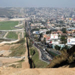 The U.S.-Mexico border between San Diego to the left and Tijuana to the right contrasts the differences in development between the two nations.