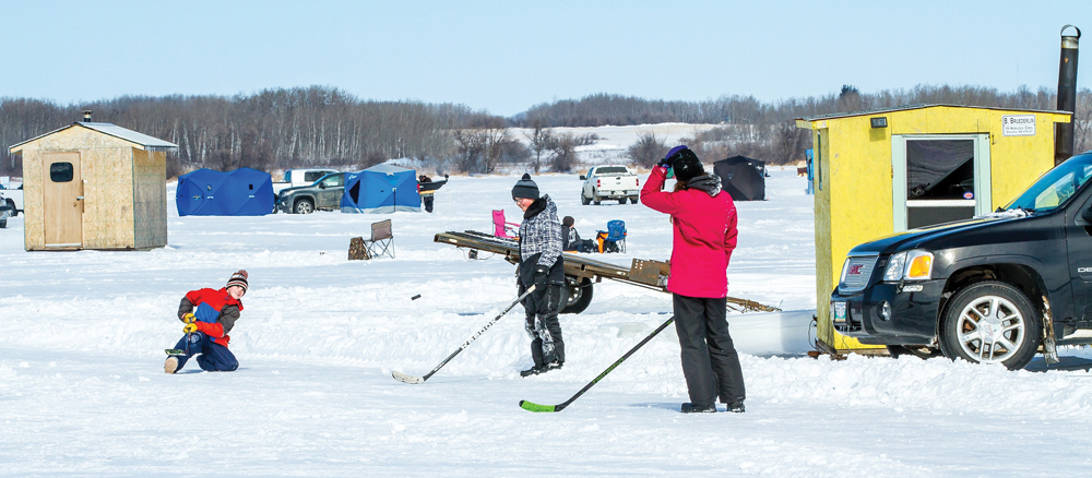 When the fishing got a little slow, in true Canadian fashion the hockey sticks came out. Nallan Reynolds of Rapid City, Natham Pollichuk of Minnedosa and Bethan Reynolds  decided to play a little road hockey after lunch.
