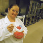 Canadian Prairie Garden Puree COO Kelly Beaulieu in happier times, showcasing one of the company’s purées.
