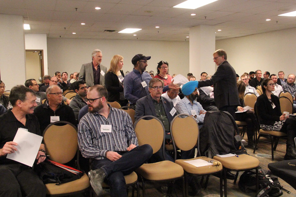 The Prairie Recommending Committee for Wheat, Rye and Triticale (PRCWRT) has streamlined voting on new varieties seeking a recommendation for registration. 
The PRCWRT held its annual meeting in Winnipeg Mar. 2. Here ballots are being distributed to members of the PRCWRT’s cultivar voting panel.