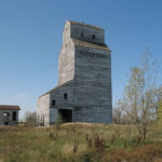 An elevator in Ridgeville, northeast of Emerson, was constructed in 1947  by the Paterson Grain Company, supplementing an older elevator from  1935. Both elevators were closed when the CN Ridgeville Subdivision was  abandoned in 1981 and the older one was demolished at that time. The  newer elevator sat vacant for many years until, in 2009, it was restored  for use in mixing livestock feed. It was destroyed by fire in April  2010.