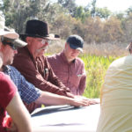 Taking a bit of time to create a grazing plan will pay good dividends for years, says rangeland specialist Pete Deal (centre in cowboy hat).