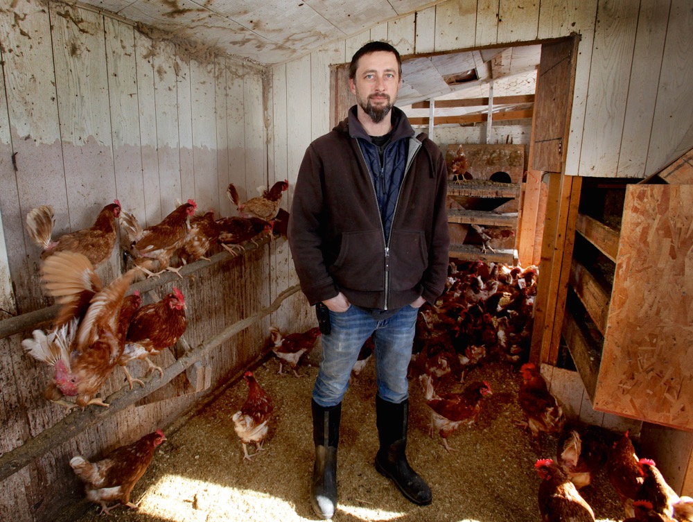 Rick Kurbis stands inside the chicken coop on his farm, where he had a close call with toxic hydrogen sulphide gas on February 13, 2017.