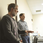 Blain Hjertaas (l) presents on carbon sequestration and regenerative agriculture March 21 in Brandon.
