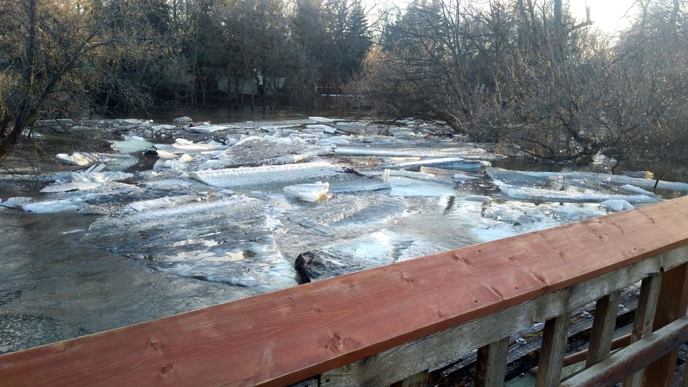 Ice clogs the Boyne River in Carman, backing up water into residential areas. The town and neighbouring RM were among the eight areas to announce states of emergency as of April 2.
