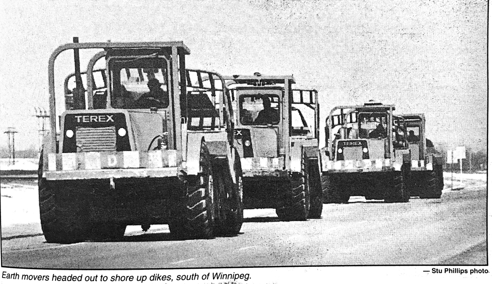 Earthmovers roll to shore up dikes