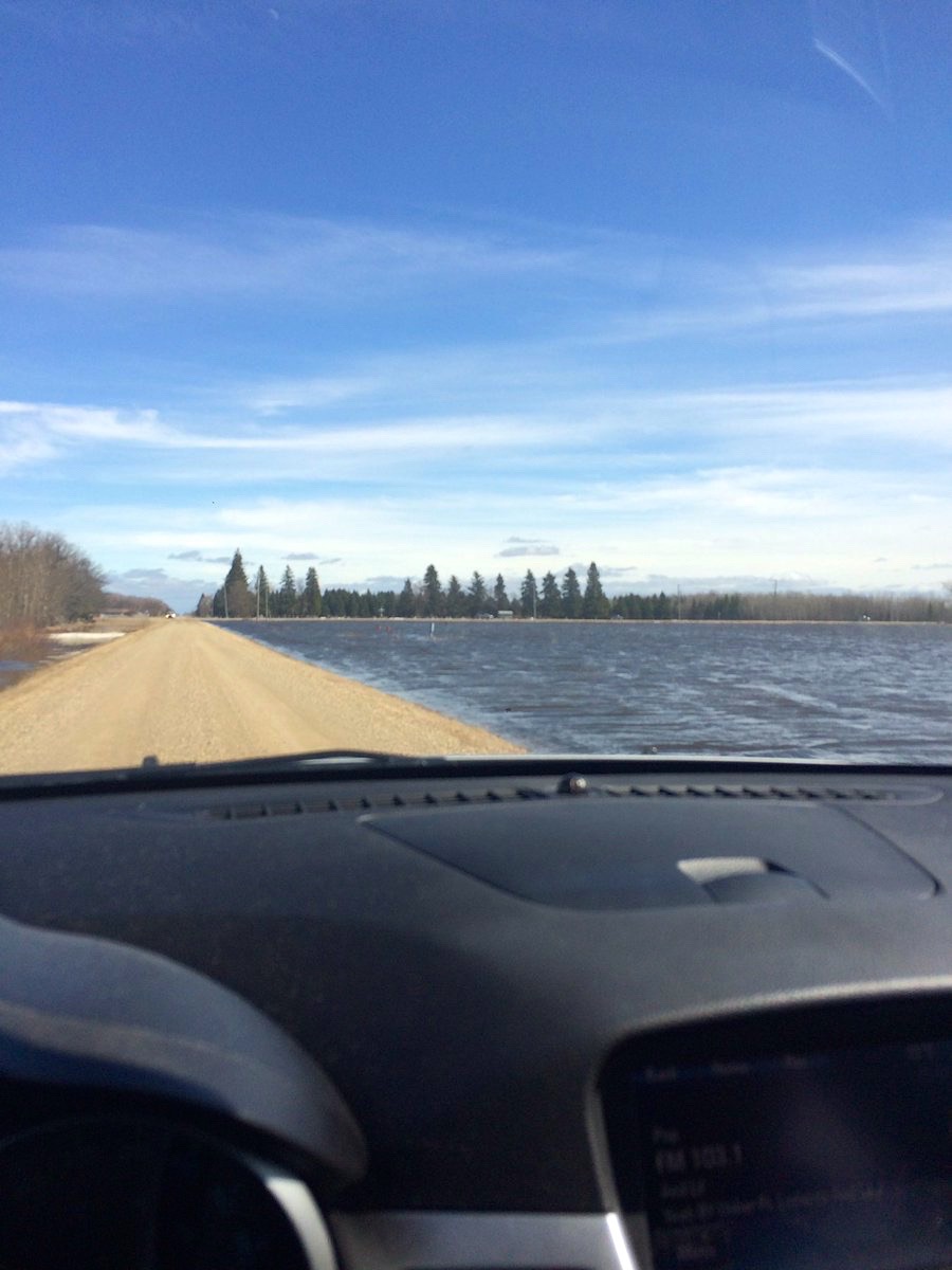 Water rises along rural roads near St. Claude in the RM of Grey. The municipality saw significant overland flooding and was one of eight to have declared states of emergency by April 2.