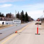 Provincial Hwy 247 at Carman was closed April 2 as floodwaters came over the road threatening houses.
