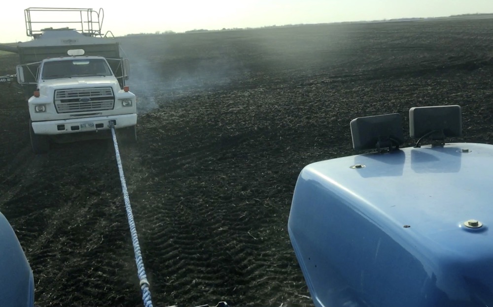 VIDEO: Near miss as tow hook snaps, smashes into tractor
