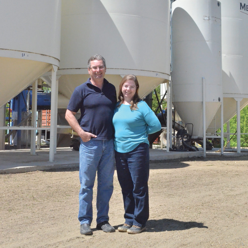 Dan and Fran DeRuyck stand in front of their recently reopened organic cleaning plant south of Treherne.