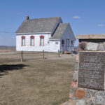 Star Mound School with pioneer dedication monument.