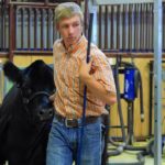 Justin Carvey of Alexander, Man., leads in his winning heifer during the 2017 Manitoba Summer Fair junior cattle show.