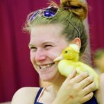 Lindsay Anderson of Brandon cuddles with a duckling at the Manitoba Summer Fair petting zoo June 11. 