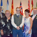 Swan River resident Austen Anderson (centre) is this year’s Canadian Angus Association Outstanding Young Angus Breeder.