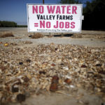 A protest sign outside Bakersfield, California in 2015 highlighted the urgency of the drought situation that year. Climate researchers say Arctic warming likely contributed to the severity.