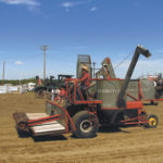 Small self-propelled combines, like this Massey Harris being driven in a parade at the Manitoba Agricultural Museum, began to appear shortly after the end of the Second World War.