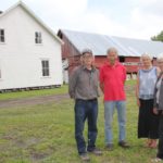 The Klippenstein house barn, brought here in 1876, is owned by the Neubergthal Heritage Foundation. NHF board members Shaun Friesen (l-r), Ray Hamm, Norma Giesbrecht and Karen Martens are excited about the potential to raise cash for its restoration through a national crowd sourcing platform.