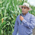 Dr. Nasir Javed of the University of Manitoba presents first-year findings from the cold-tolerance corn nursery at Carberry’s Canada-Manitoba Crop Diversification Centre during an Aug. 16 field day.